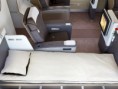 /album/photo-gallery-classes-and-comfort/a4d84032d0e9846c5b07b5024767f1341-lufthansa-new-747-first-class-bed-and-chair-jpg/